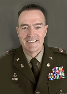 Photo of author and lead artist from his time on active duty